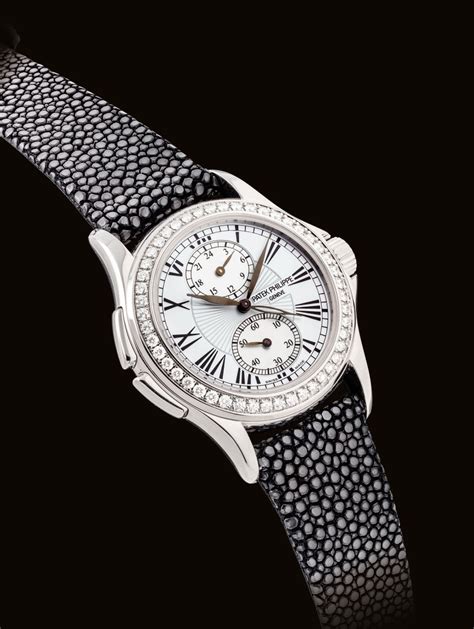 Patek Philippe. A Lady's Fine 18k White Gold and Diamond